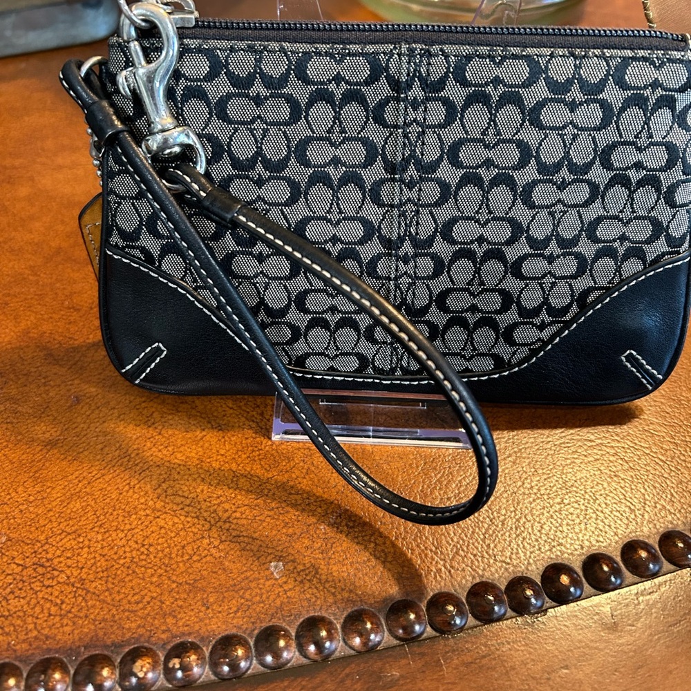 Coach signature fabric and smooth leather wristlet